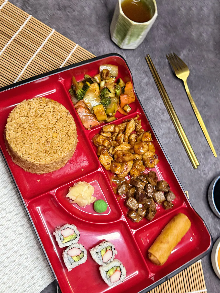 Bento Box with Rice and Stir-Fry at 3 Ninja's Washingtonville，a Japanese Restaurant in Washingtonville